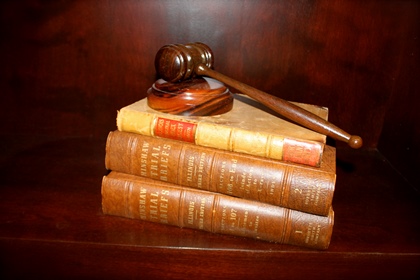 gavel on top of law books